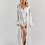 ALT's white Melita feather satin robe worn open, floor-length with feather trim at the cuffs and hem.