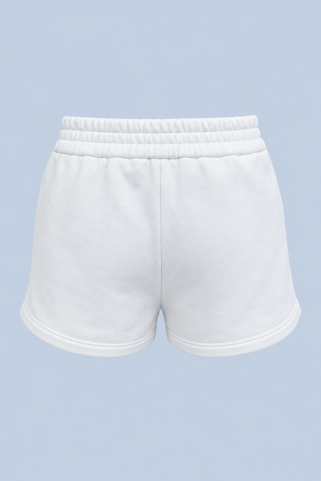 White Althea track short shown on its own from behind, with a double elasticated waistband, a center back seam and a curved hem.