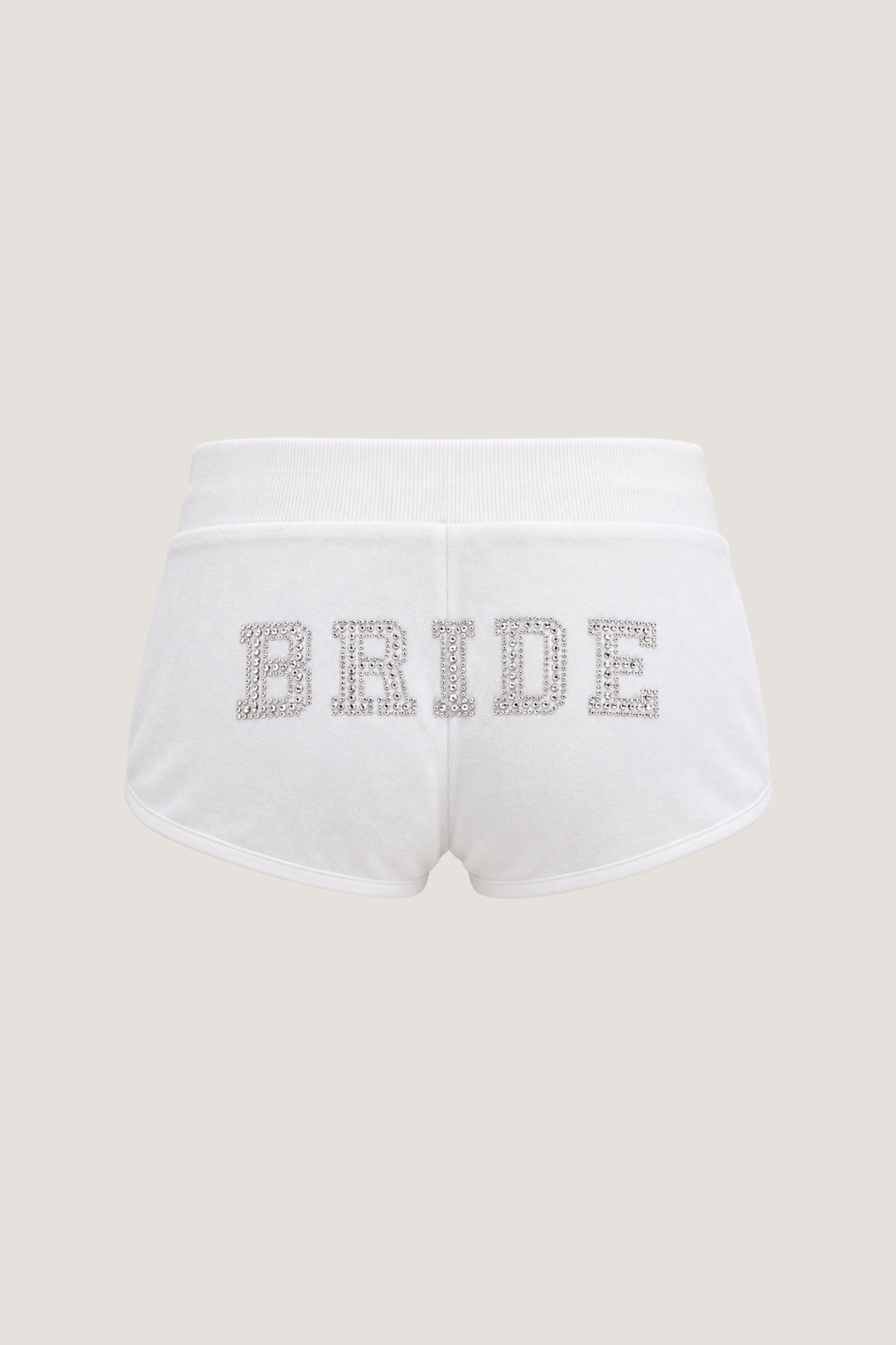 ALT's white Heiress rhinestone velour short, seen from behind on a ghost mannequin with BRIDE in rhinestones across the back.