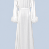 White Melita feather satin robe shown on its own from behind, with a self-tie belt at the waist and feather trim at the cuffs and hem.
