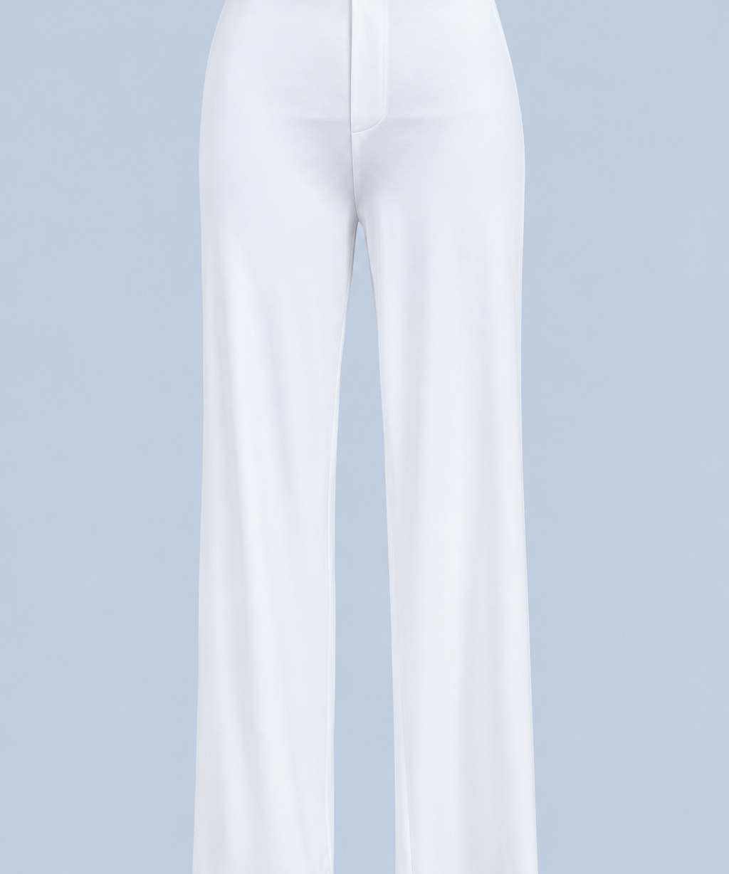 White Vivienne travel pant shown on its own from the front, with a flat waistband, a stitched mock fly and a wide straight leg.